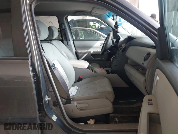 2012 Honda Pilot LX with VIN 5FNYF4H23CB015371, listed as a IAAI auction lot 41852341 with 180,000 mi miles and . Bid and sale history available at carsss.com. Image 5.