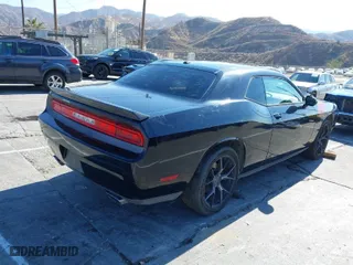 2013 Dodge Challenger R/T with VIN 2C3CDYBT4DH517881, listed as a IAAI auction lot 41422647 with 76,889 mi miles. Bid and sale history available at carsss.com. Image 4.