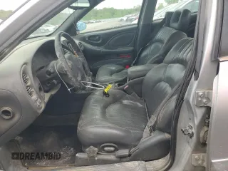 2001 Pontiac Bonneville SLE z VIN 1G2HY54K614247302, wystawiony jako Copart lot #55119465 z przebiegiem 257 120 mil mil oraz Szkody całkowita. Historia ofert i sprzedaży dostępna na DreamBid. Obrazek 7.