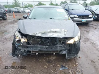2014 Mazda 3 i Touring z VIN JM1BM1L70E1212930, wystawiony jako IAAI lot #42434348 z przebiegiem 107 209 mil mil oraz . Historia ofert i sprzedaży dostępna na DreamBid. Obrazek 6.