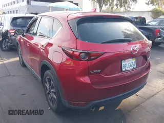 2018 Mazda CX-5 Grand Touring with VIN JM3KFBDM2J0333017, listed as a IAAI auction lot 41850431 with 85,000 mi miles. Bid and sale history available at carsss.com. Image 3.