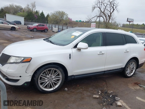 2014 Lincoln MKT EcoBoost with VIN 2LMHJ5AT0EBL50661, listed as a IAAI auction lot 41898237 with 118,770 mi miles and . Bid and sale history available at DreamBid. Image 14.