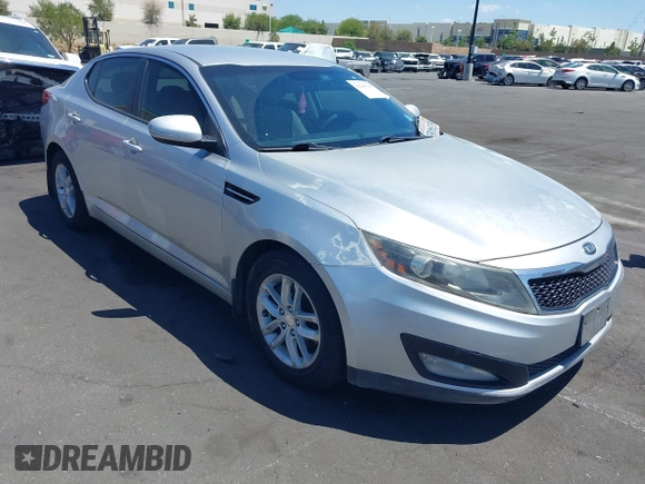 2013 Kia Optima LX z VIN KNAGM4A7XD5389662, wystawiony jako IAAI lot #42265945 z przebiegiem 164 488 mil mil oraz . Historia ofert i sprzedaży dostępna na DreamBid. Obrazek 1.