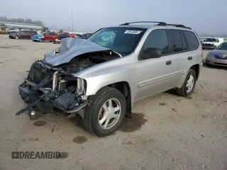 2004 GMC Envoy SLE with VIN 1GKDT13S942422049, listed as a Copart auction lot 43649905 with 150,713 mi miles and Salvage Title. Bid and sale history available at carsss.com. Image 1.