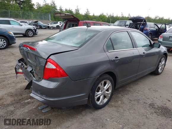 2012 Ford Fusion SE z VIN 3FAHP0HA1CR424096, wystawiony jako IAAI lot #42364116 z przebiegiem 53 026 mil mil oraz . Historia ofert i sprzedaży dostępna na DreamBid. Obrazek 4.