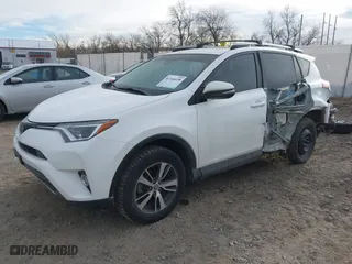 2018 Toyota RAV4 XLE with VIN 2T3RFREV2JW777906, listed as a IAAI auction lot 41164038 with 89,049 mi miles. Bid and sale history available at carsss.com. Image 2.