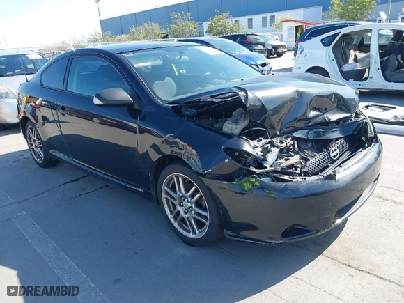 2008 Scion tC Spec with VIN JTKDE167580234717, listed as a IAAI auction lot 41980475 with 164,163 mi miles. Bid and sale history available at carsss.com. Image 1.