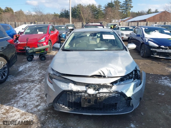 2021 Toyota Corolla LE with VIN JTDEPMAE7MJ173131, listed as a IAAI auction lot 41372716 with 58,677 mi miles. Bid and sale history available at carsss.com. Image 12.