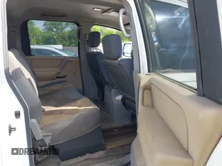 2004 Nissan Titan LE with VIN 1N6AA07A34N517511, listed as a IAAI auction lot 42250560 with 122,189 mi miles and . Bid and sale history available at DreamBid. Image 8.