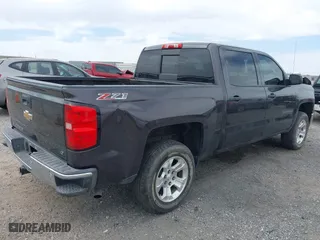 2014 Chevrolet Silverado 1500 LT with VIN 3GCUKREC7EG561639, listed as a IAAI auction lot 42020364 with 154,785 mi miles. Bid and sale history available at carsss.com. Image 4.