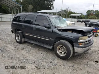 2005 Chevrolet Tahoe LS with VIN 1GNEC13T55R242950, listed as a Copart auction lot 74131954 with 283,935 mi miles and Salvage Title. Bid and sale history available at carsss.com. Image 4.