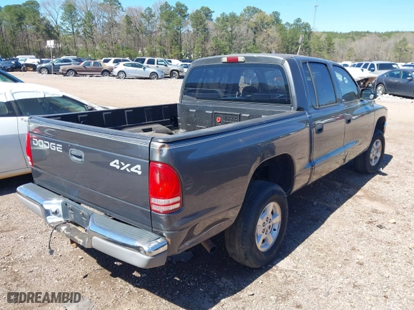 2002 Dodge Dakota SLT with VIN 1B7HG48NX2S623588, listed as a IAAI auction lot 41793068 with 213,159 mi miles. Bid and sale history available at carsss.com. Image 4.