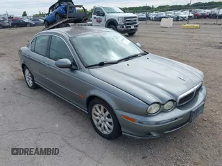 2003 Jaguar X-Type 2.5L Manual z VIN SAJEA51D83XD54169, wystawiony jako IAAI lot #42325883 z przebiegiem 132 204 mil mil oraz . Historia ofert i sprzedaży dostępna na DreamBid. Obrazek 1.
