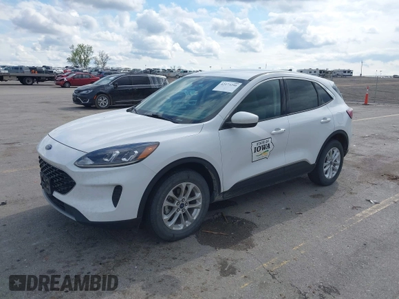 2020 Ford Escape SE with VIN 1FMCU9G67LUC31633, listed as a IAAI auction lot 42173290 with 136,937 mi miles and . Bid and sale history available at DreamBid. Image 2.