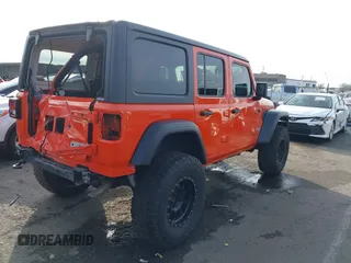 2019 Jeep Wrangler Unlimited Sport S with VIN 1C4HJXDG7KW568441, listed as a IAAI auction lot 41142271 with 73,698 mi miles and . Bid and sale history available at DreamBid. Image 4.