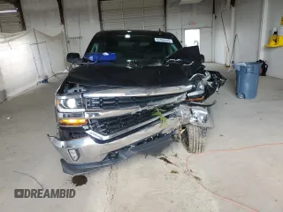 2018 Chevrolet Silverado 1500 LT with VIN 3GCUKREC2JG345482, listed as a Copart auction lot 52452445 with 100,824 mi miles and Salvage Title. Bid and sale history available at DreamBid. Image 5.