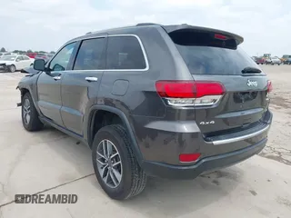 2021 Jeep Grand Cherokee 80th Anniversary with VIN 1C4RJFBG0MC504148, listed as a IAAI auction lot 42063979 with 77,941 mi miles and . Bid and sale history available at DreamBid. Image 3.