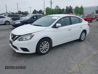 2018 Nissan Sentra S with VIN 3N1AB7AP6JY280214, listed as a IAAI auction lot 42173409 with 142,852 mi miles and . Bid and sale history available at DreamBid. Image 2.