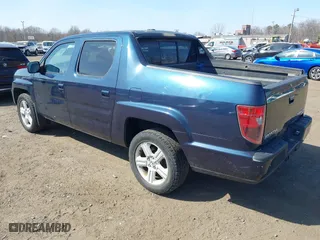 2011 Honda Ridgeline RTL with VIN 5FPYK1F51BB011686, listed as a IAAI auction lot 41790303 with 110,648 mi miles. Bid and sale history available at carsss.com. Image 3.