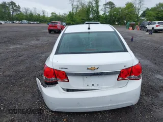 2014 Chevrolet Cruze 1LT with VIN 1G1PC5SB6E7233051, listed as a IAAI auction lot 42214334 with 88,389 mi miles and . Bid and sale history available at DreamBid. Image 16.