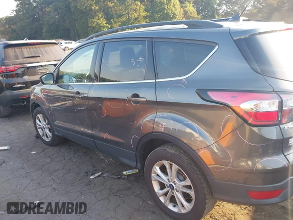 2018 Ford Escape SEL with VIN 1FMCU9HD0JUC25036, listed as a IAAI auction lot 40518589 with 143,076 mi miles. Bid and sale history available at carsss.com. Image 14.