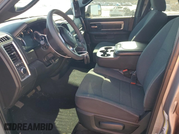 2023 Ram 1500 Classic SLT with VIN 1C6RR7GG9PS556256, listed as a Copart auction lot 46034005 with 17,711 mi miles and Salvage Title. Bid and sale history available at carsss.com. Image 7.