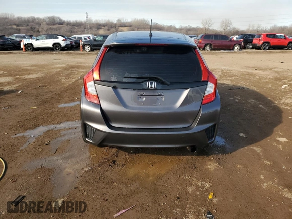2017 Honda Fit LX with VIN 3HGGK5G51HM700577, listed as a Copart auction lot 48713335 with 197,728 mi miles and Salvage Title. Bid and sale history available at DreamBid. Image 6.