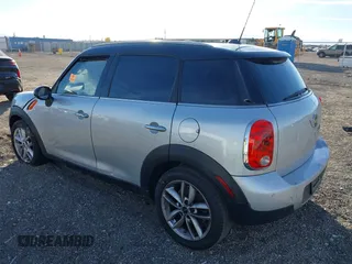 2012 MINI Countryman with VIN WMWZB3C59CWM05749, listed as a IAAI auction lot 38329304 with 64,590 mi miles and . Bid and sale history available at DreamBid. Image 3.