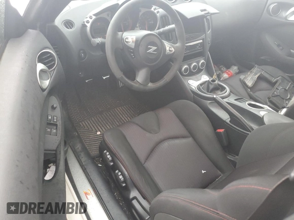 2014 Nissan 370Z with VIN JN1AZ4EH2EM633845, listed as a Copart auction lot 63583194 with 0 mi miles and Salvage Title. Bid and sale history available at carsss.com. Image 8.