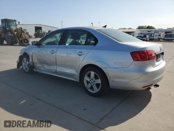 2012 Volkswagen Jetta TDI w/Premium & Nav with VIN 3VWLL7AJ8CM349006, listed as a Copart auction lot 54934995 with 110,596 mi miles and Salvage title. Bid and sale history available at DreamBid. Image 2.