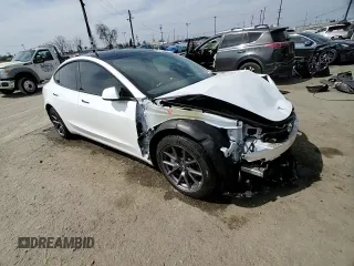 2022 Tesla Model 3 Long Range z VIN 5YJ3E1EB3NF174314, wystawiony jako Copart lot #52713325 z przebiegiem 27 646 mil mil oraz Szkoda całkowita • Salvage title. Historia ofert i sprzedaży dostępna na DreamBid. Obrazek 11.
