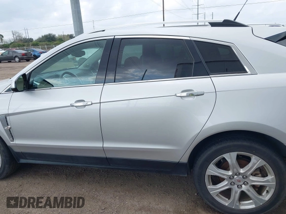 2011 Cadillac SRX Premium Collection with VIN 3GYFNCEY9BS516469, listed as a IAAI auction lot 41536682 with 159,594 mi miles. Bid and sale history available at carsss.com. Image 12.