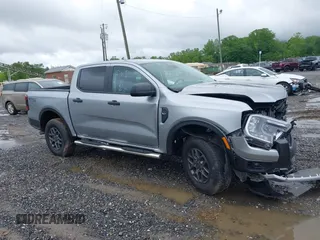 2024 Ford Ranger XLT with VIN 1FTER4HH0RLE19703, listed as a IAAI auction lot 42245087 with 1,990 mi miles and . Bid and sale history available at DreamBid. Image 1.