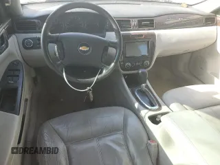 2013 Chevrolet Impala LTZ with VIN 2G1WC5E35D1173047, listed as a Copart auction lot 54965245 with 135,115 mi miles and Salvage Title. Bid and sale history available at DreamBid. Image 8.