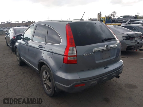 2009 Honda CR-V EX-L with VIN JHLRE38759C002661, listed as a IAAI auction lot 41956424 with 162,685 mi miles and . Bid and sale history available at carsss.com. Image 3.