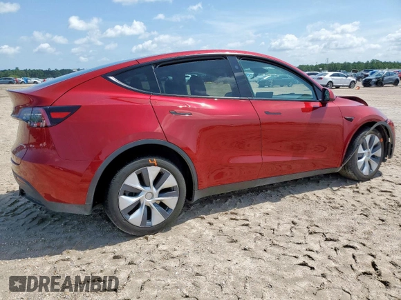 2024 Tesla Model Y Long Range with VIN 7SAYGDEE5RA235910, listed as a Copart auction lot 60988605 with 23,882 mi miles and Salvage title. Bid and sale history available at DreamBid. Image 3.