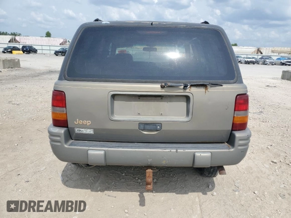 1996 Jeep Grand Cherokee Limited with VIN 1J4GZ78S3TC395758, listed as a Copart auction lot 60326205 with Not provided miles and Salvage title. Bid and sale history available at DreamBid. Image 6.