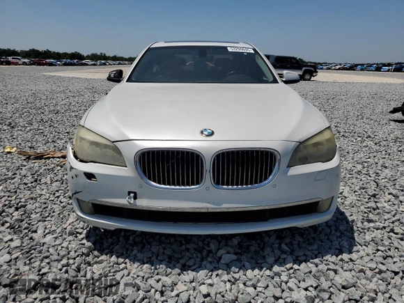 2012 BMW 7 Series 740i with VIN WBAKA4C59CDS99079, listed as a Copart auction lot 53299695 with 142,692 mi miles and Clean Title. Bid and sale history available at carsss.com. Image 5.