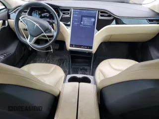 2014 Tesla Model S 60 with VIN 5YJSA1H19EFP51003, listed as a Copart auction lot 52164335 with 105,926 mi miles and Salvage Title. Bid and sale history available at DreamBid. Image 8.