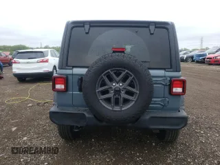 2024 Jeep Wrangler Sport S with VIN 1C4PJXDG1RW305304, listed as a Copart auction lot 57555635 with 5,705 mi miles and Salvage title. Bid and sale history available at DreamBid. Image 6.