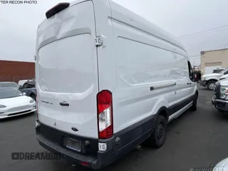 2020 Ford Transit Cargo with VIN 1FTBW3X87LKB80879, listed as a IAAI auction lot 42704425 with 104,720 mi miles and . Bid and sale history available at DreamBid. Image 18.