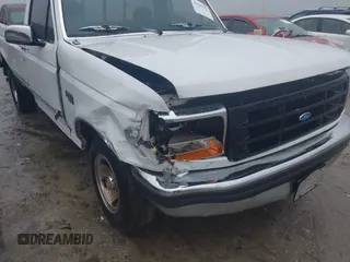 1994 Ford F-150 with VIN 1FTEF15N0RNA67826, listed as a IAAI auction lot 41547971 with 233,713 mi miles. Bid and sale history available at carsss.com. Image 6.