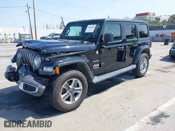 2020 Jeep Wrangler Unlimited Sahara with VIN 1C4HJXEN6LW235159, listed as a IAAI auction lot 42045083 with 68,400 mi miles and . Bid and sale history available at DreamBid. Image 17.