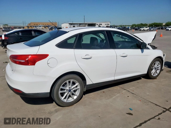 2018 Ford Focus SE z VIN 1FADP3F29JL225126, wystawiony jako Copart lot #52817265 z przebiegiem Nie podano mil oraz Szkoda całkowita • Salvage title. Historia ofert i sprzedaży dostępna na DreamBid. Obrazek 3.