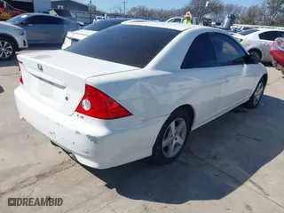 2004 Honda Civic LX with VIN 1HGEM21584L029865, listed as a IAAI auction lot 41488497 with 189,493 mi miles. Bid and sale history available at carsss.com. Image 4.