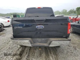 2016 Ford F-150 XLT with VIN 1FTEW1EG7GKD00973, listed as a Copart auction lot 56011785 with 128,344 mi miles and Salvage title. Bid and sale history available at DreamBid. Image 6.
