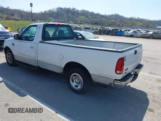 2002 Ford F-150 XL with VIN 1FTRF17W72NA67786, listed as a IAAI auction lot 41869585 with 180,262 mi miles. Bid and sale history available at carsss.com. Image 3.
