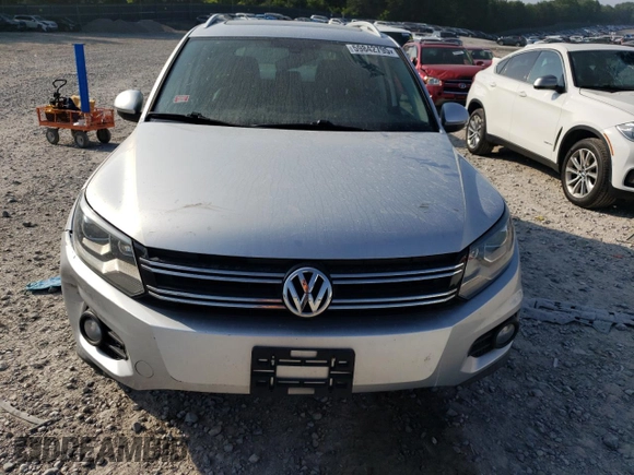 2016 Volkswagen Tiguan S z VIN WVGAV7AX3GW504720, wystawiony jako Copart lot #59842795 z przebiegiem 103 670 mil mil oraz Czysty tytuł • Clean title. Historia ofert i sprzedaży dostępna na DreamBid. Obrazek 5.