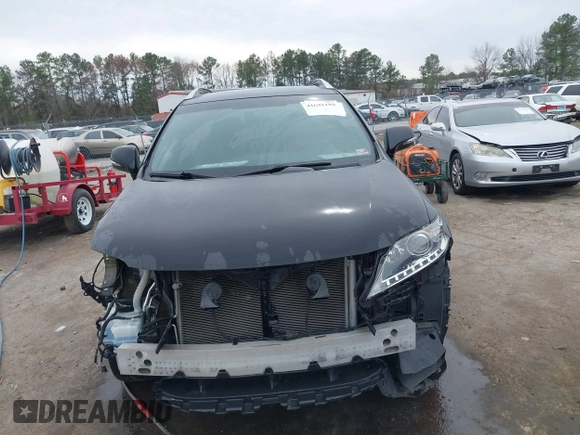 2015 Lexus RX 350 z VIN 2T2BK1BA2FC287589, wystawiony jako IAAI lot #41641194 z przebiegiem 159 971 mil mil oraz . Historia ofert i sprzedaży dostępna na DreamBid. Obrazek 13.
