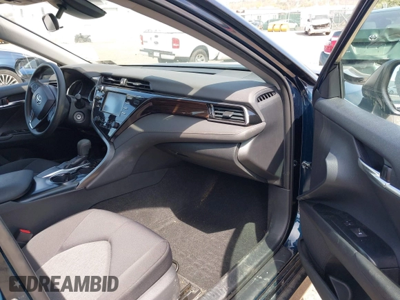 2019 Toyota Camry LE with VIN 4T1B11HK6KU276644, listed as a IAAI auction lot 42037249 with 23,677 mi miles and . Bid and sale history available at DreamBid. Image 5.
